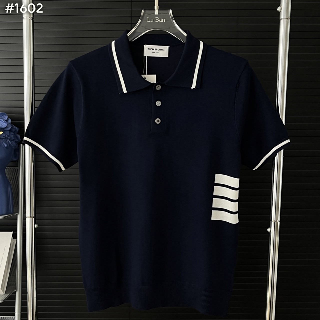 사선 카라 폴로 니트