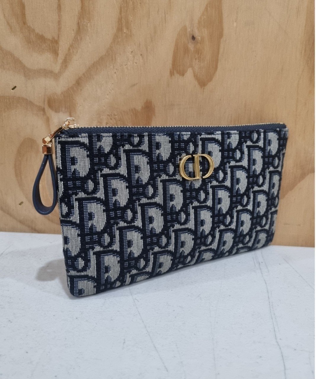 디 오블리크 슬림 파우치